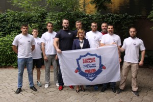 депутат МГД  Святенко с флагом  Безопасная столица
